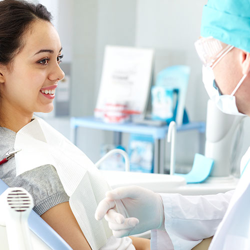 patient-talking-to-dentist patient talking to dentist