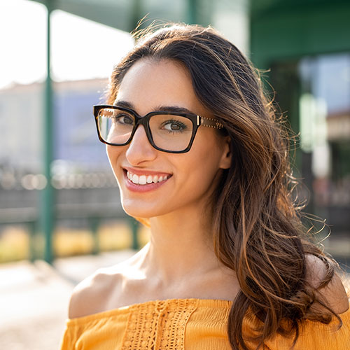 young-woman-big-smile-glasses young woman big smile